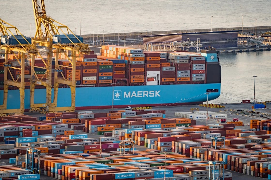 Shipping containers and cargo ships seen in the port of Barcelona, one of the biggest sea ports of Europe. (Davide Bonaldo/SOPA Images via Reuters Connect)
