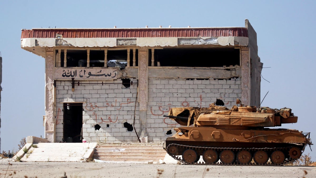 A Syrian army military tank is seen in the town of Morek, Hama district