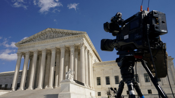 A TV camera points to the U.S. Supreme Court as justices inside heard arguments in Gonzalez v. Google