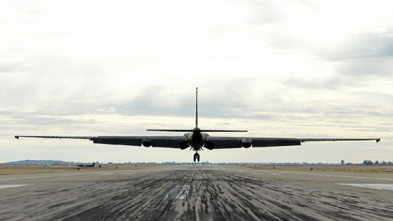 A U-2 spy plane that is being used to test AI applications lands at an air field