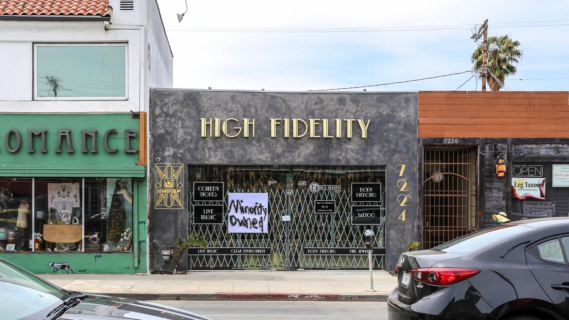 A black owned business on Melrose Avenue named High Fidelity shows minority owned sign