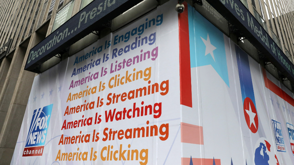 A headline for a story on U.S. President Joe Biden is displayed at the Fox News headquarters in New York City.