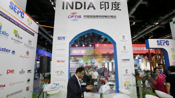 A man works at an India booth during China International Fair for Trade in Services in Beijing