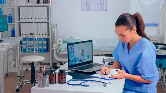 A nurse receives prescription information from a doctor through a web video call.