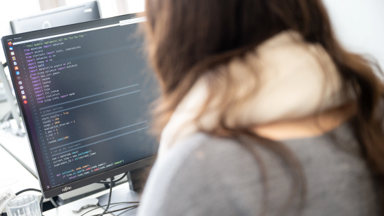 A researcher works on code at the AI Research Building at the University of Tübingen in Germany