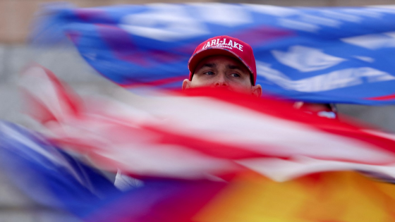 A supporter of defeated Republican candidate for Arizona governor Kari Lake protests outside of state capitol