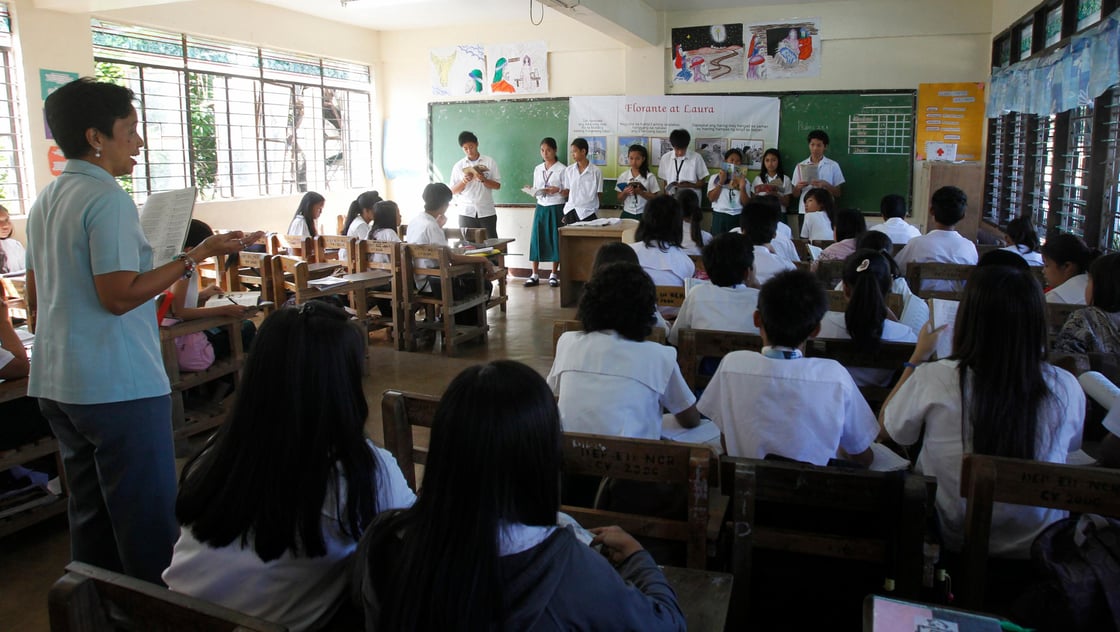 A teacher leads a discussion during classes at a government high school in Muntinlupa