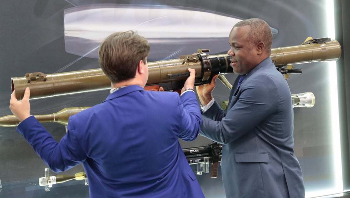 A visitor examines a Russian rocket-propelled grenade launcher RPG-29 during the Russia-Africa Economic Forum Exhibition