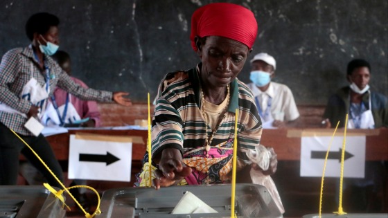 A voter casts her ballot at a polling station in Burundi