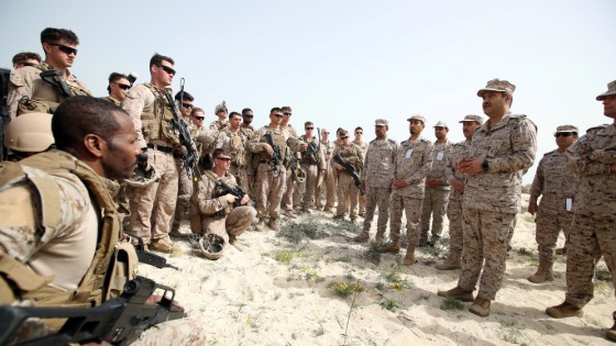 Admiral Ali Saeed Al Shehri speaks with soldiers during mixed maritime exercise with U.S. Navy and Saudi Royal Navy