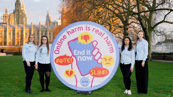 Advocates from Girlguiding U.K. unveil a badge urging an end to online harms ahead of meeting in London with members of Parliament to discuss the Online Safety Bill