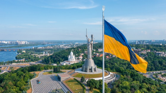 Aerial view of the Ukrainian flag waving in the wind