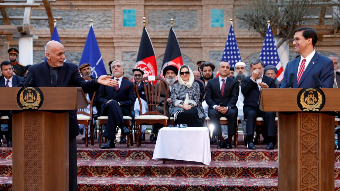 Afghan President Ashraf Ghani speaks as U.S. Defense Secretary Mark Esper looks on during a news conference in Kabul