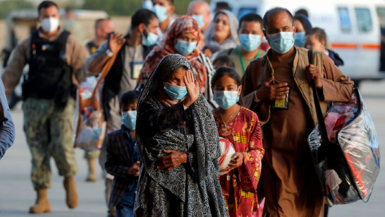 Afghan citizens, who have been evacuated from Kabul, arrive at Naval Station Rota Air Base