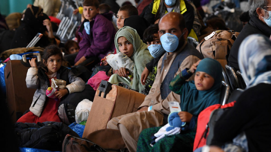 Afghan refugees are processed inside Hangar 5 at Ramstein Air Base in Germany