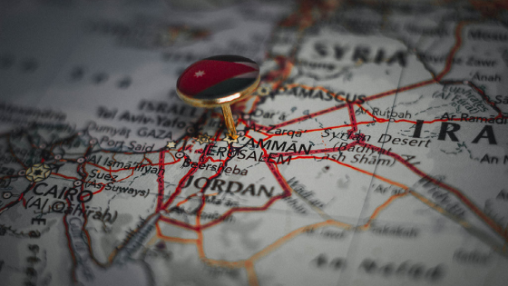 Amman pinned on a map with the flag of Jordan