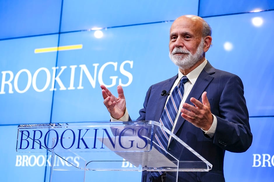 Ben Bernanke speaks at podium.