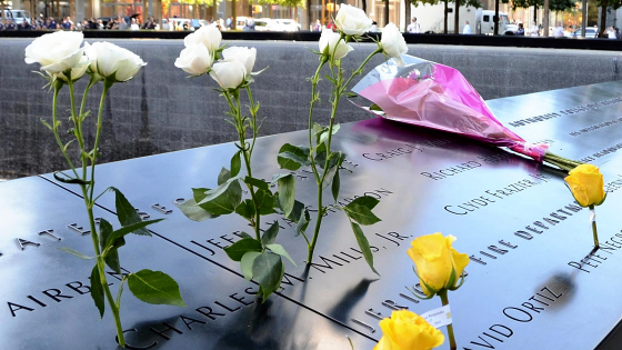 Bereaved families mourn the victims of the terrorist attack at the site of the World Trade Center Building in New York