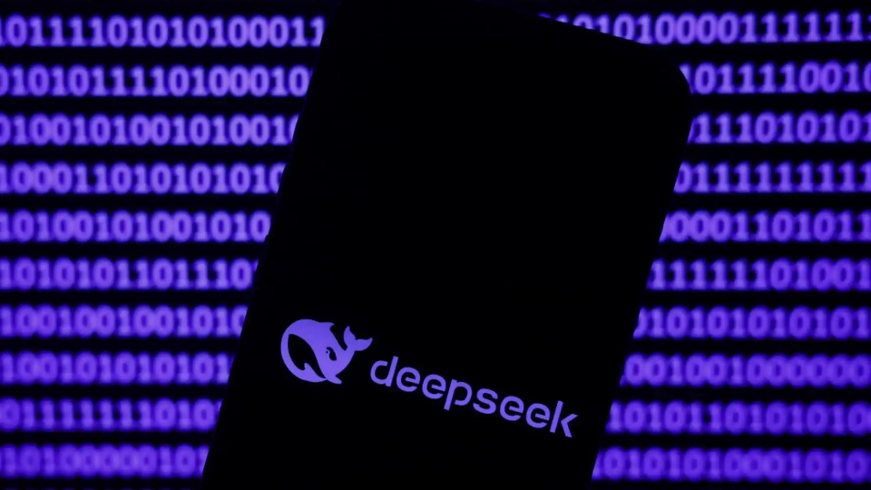 Binary code displayed on a laptop screen and DeepSeek logo displayed on a phone screen