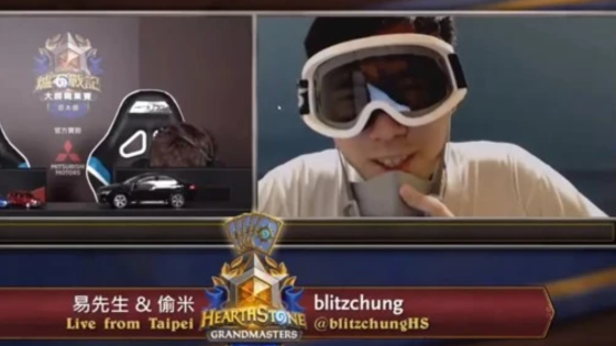 Blitzchung removes his mask during an interview following his Hearthstone tournament match on October 6, 2019