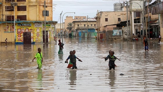 Children play in a flooded street in Hamerweyne district of Mogadishu, Somalia.