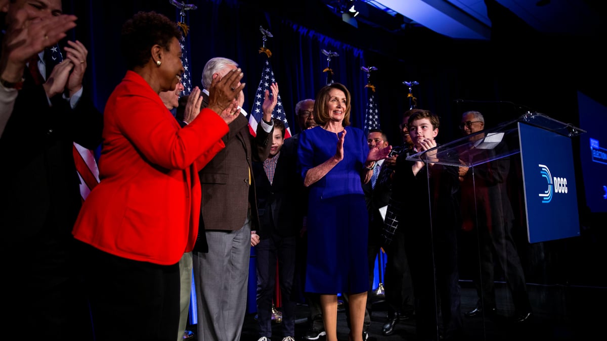 U.S. House Minority Leader Nancy Pelosi reacts alongside fellow House Democrats to the results of the U.S. midterm elections at a Democratic election night rally in Washington.