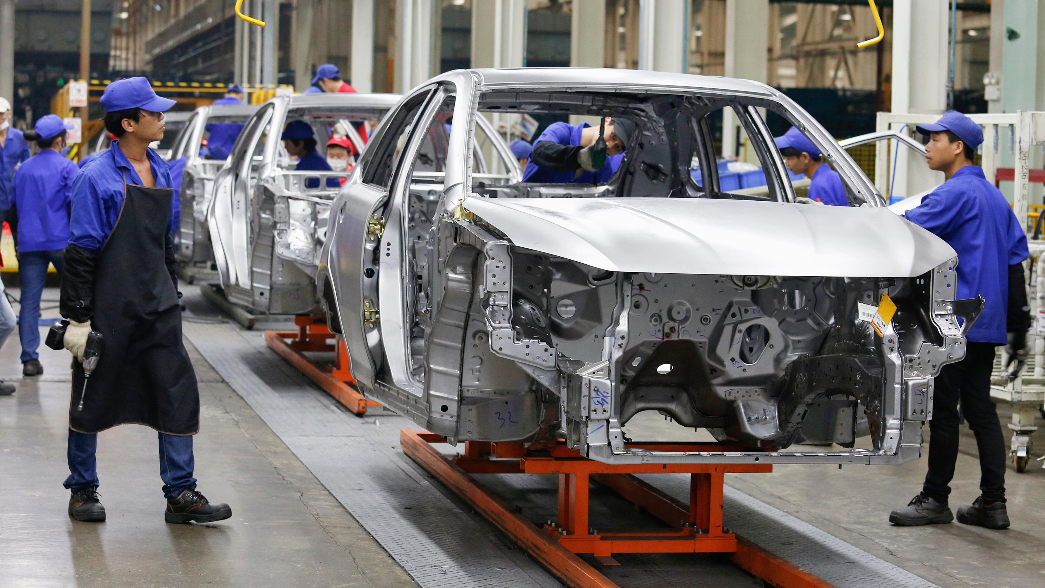 Cars are built at a BYD assembly line in Shenzhen, China.