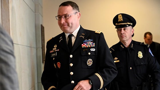 Lt. Col. Alexander Vindman, director for European Affairs at the National Security Council, arrives to testify as part of the U.S. House of Representatives impeachment inquiry into U.S. President Trump