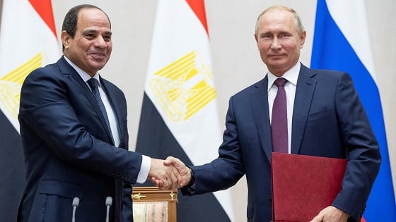 Russian President Vladimir Putin and Egyptian President Abdel Fattah al-Sisi shake hands during a signing ceremony following their meeting in the Black Sea resort of Sochi, Russia