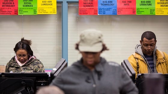 Voters cast their ballot in the U.S. midterm elections in Ferguson, Missouri.