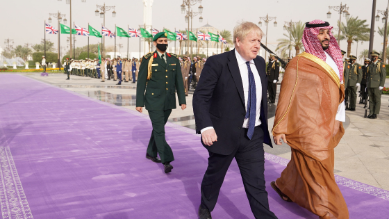 British Prime Minister Boris Johnson is welcomed by Saudi Crown Prince, Mohammed bin Salman, ahead of a meeting at the Royal Court