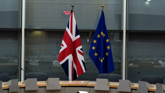 British Union Jack and EU flags in a meeting room