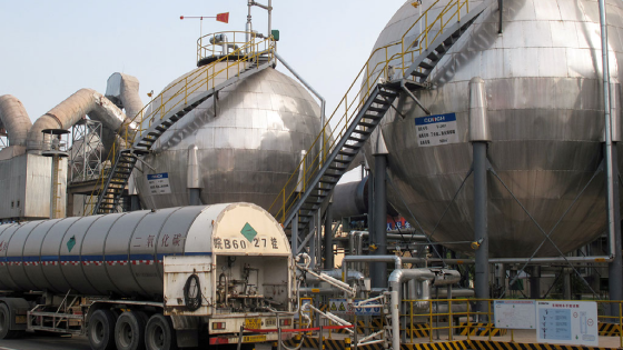 CO2 storage tanks are seen at a cement plant and carbon capture facility in Wuhu