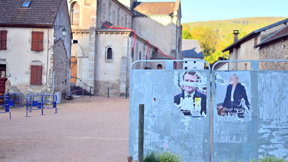 Campaign posters for Emmanuel Macron and Marine Le Pen