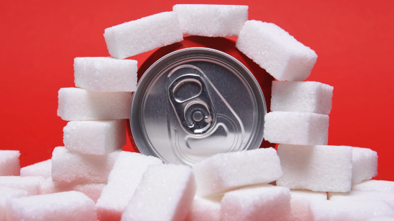 Can of soda held in place by sugar cubes