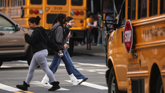 Children are seen walking to school in New York