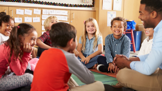 Children sitting together in a school classroom