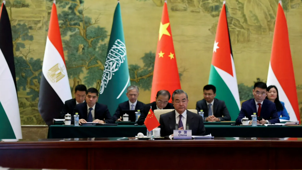 Chinese Foreign Minister Wang Yi attends a meeting with Saudi, Jordanian, Egyptian, Indonesian, Palestinian, and Organization of Islamic Cooperation delegations