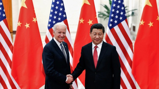 Chinese President Xi Jinping shakes hands with U.S. Vice President Joe Biden