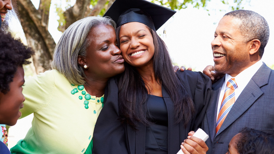 College graduate with her family