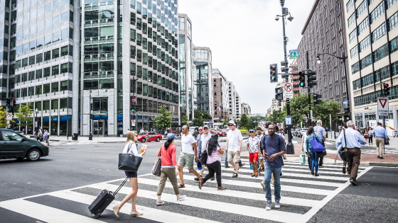 Crowd of people crossing the street in Washington