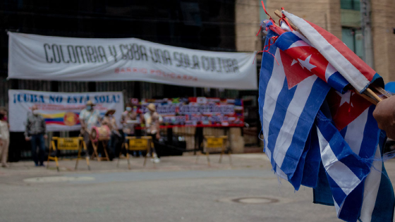 Cuban flags as Cuban residents that live in Colombia protest against the unrest and violence