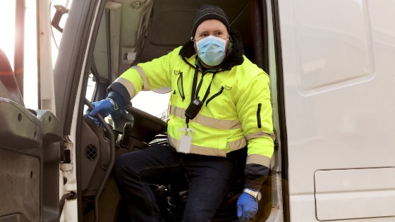 Delivery driver exiting vehicle