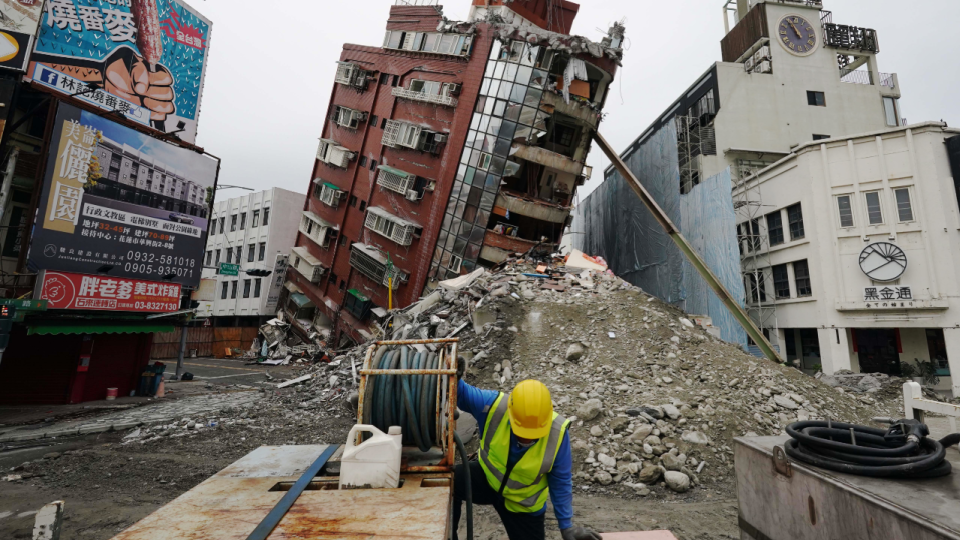 Demolition work underway on a collapsed building at central Hualien in Taiwan on April 5, 2024