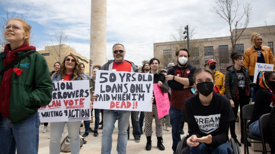 Demonstrators gather at the Department of Education headquarters in Washington