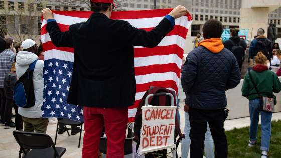 Demonstrators gather at the Department of Education headquarters in Washington