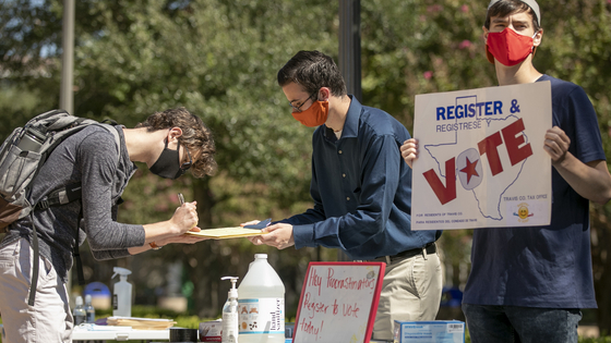 Deputy voter registrars at the University of Texas.