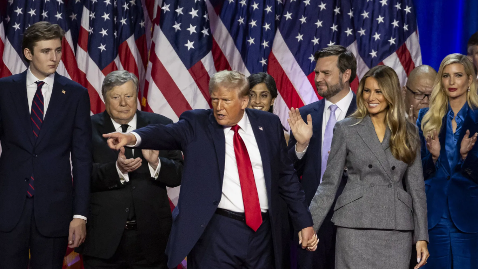 Donald Trump is flanked by his family and supporters on election night 2024