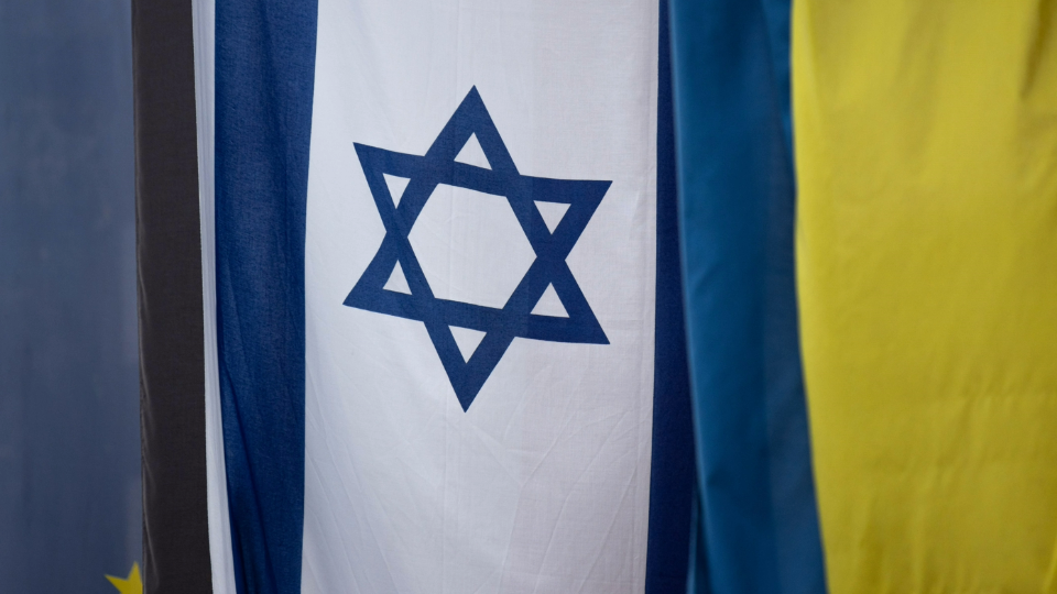 EU, Israeli and Ukrainian flags hang in Frankfurt