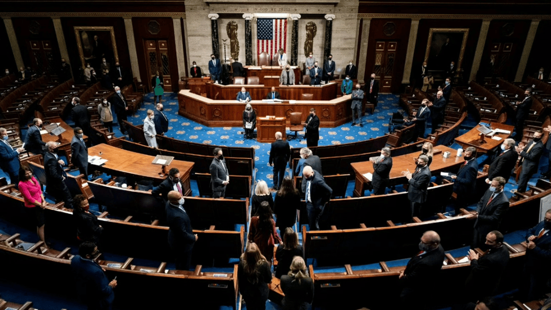 Electoral college votes are brought in before House Speaker Nancy Pelosi and Vice President Mike Pence on January 6, 2021